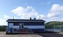 Aéroport de La Tabatière (ZLT) lors des travaux de pavage du stationnement.jpg