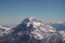 Mountain tops, with clouds shown.
