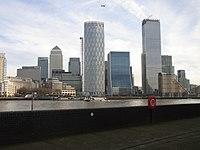 The Canary Wharf and Isle of Dogs business district as viewed from the south-west, December, 2019. The tallest building in this cluster is One Canada Square with the pyramid-shaped roof which was completed in 1991 and stands at 235m