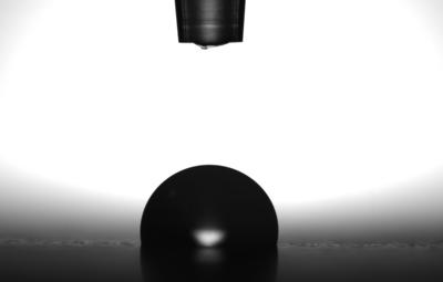Sessile drop measurement with a contact angle meter.
