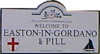 Street sign with the words Welcome to Easton in Gordano & Pill.
