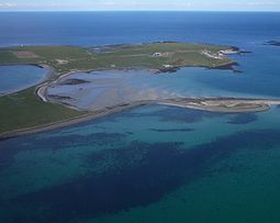 Papa Stronsay from the air. The monastery can be seen at the top right.