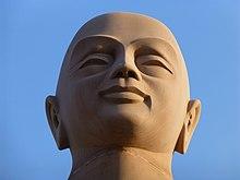 Bodh Gaya - Buddha Statue - Upali (9227722130).jpg