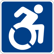 white line figure of a person leaning forward, arm raised to propel a wheelchair, blue background