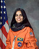 Kalpana Chawla, NASA photo portrait in orange suit.jpg
