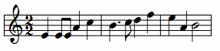 The image depicts musical notation of a fast-paced motif consisting of minims, crotchets and quavers.