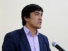 Baisalov Edil at a conference.jpg