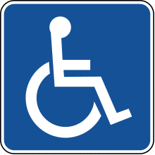 white line figure of a person seated over the axis of a wheel, blue background