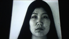Theresa Hak Kyung Cha, self-portrait frame in PERMUTATIONS film, 1976.png