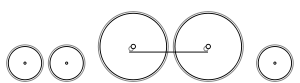 Diagram of two small leading wheels, two large driving wheels joined by a coupling rod, and one small trailing wheel