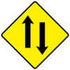 Pair of parallel arrows pointing in opposite directions