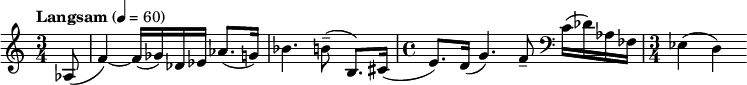 \relative c' { \clef treble \time 3/4 \tempo "Langsam" 4 = 60 \partial 8*1 aes8( f'4)~ f16( ges) des ees aes8.( g16) bes4. b8--( b,8.) cis16( \time 4/4 e8.) d16( g4.) f8-- \clef bass c16( des) aes fes \time 3/4 ees4( d) }