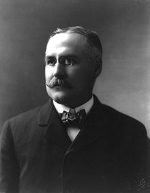John Fremont Hill, 1855-1912, head and shoulders, c1900.jpg
