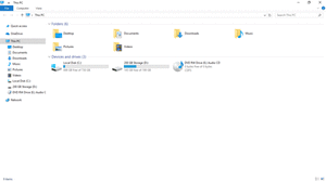 File Explorer on Windows 10 in Light App Mode showing special folders and drives, with the ribbon minimized