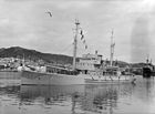 HMNZS Endeavour, the Antarctic expedition ship, Wellington Harbour, 1956 (front side view).jpg