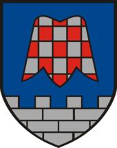 Coat of arms of Großsteinbach in Austria, depicting a stylised flower of Fritillaria meleagris