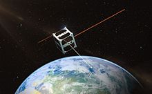 ESTCube-1 micro satellite orbiting globe and beaming light to Estonia