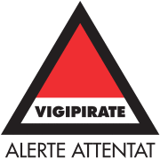 Vigipirate triangle with "Alerte Attentat" in black font
