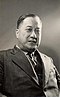Rev. Canon George She - Portrait.jpg