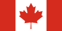 A vertical triband design (red, white, red) with a red maple leaf in the center.