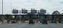Multi-lane toll plaza with cash and E-ZPass lanes