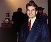 A man in his early twenties smiling at the camera.