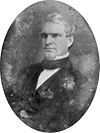 Nathan Kelsey Hall, half-length portrait, three-quarters to the left.jpg