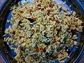 Chitranna (Lemon Rice) prepared by an indian woman.jpg