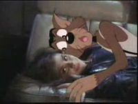 MC Skat Kat with Paula Abdul in the 1989 music video "Opposites Attract"