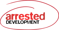 The words "Arrested Development" in red and black lettering