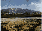 Kunlun - a mountain range in western China that extends eastward from the Indian border for 1000 miles