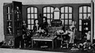 dollhouse - a house so small that it is likened to a child's plaything