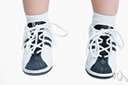 baby shoe - a shoe designed to be worn by infants