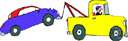 tow - the act of hauling something (as a vehicle) by means of a hitch or rope