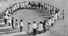 schoolyard - the yard associated with a school schoolyard - the yard associated with a school