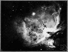 planetary nebula - a nebula that was once thought to be a star with its planets but is now thought to be a very hot star surrounded by an expanding envelope of ionized gases that emit a fluorescent glow because of intense radiation from the star