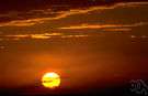 ablaze - lighted with red light as if with flames