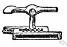 Coigne - expandable metal or wooden wedge used by printers to lock up a form within a chase