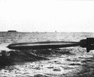 torpedo tube - a tube near the waterline of a vessel through which a torpedo is fired