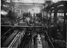 rolling mill - steel mill where metal is rolled into sheets and bars