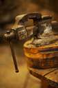 bench vise - a holding device attached to a workbench
