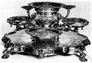 epergne - a large table centerpiece with branching holders for fruit or sweets or flowers