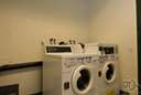 washer - a home appliance for washing clothes and linens automatically