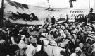 mass meeting - a large gathering of people intended to arouse enthusiasm
