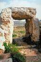 Roughhewn - of stone or timber