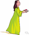 religious offering - the act of offering the bread and wine of the Eucharist