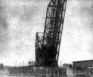 bascule - a structure or device in which one end is counterbalanced by the other (on the principle of the seesaw)