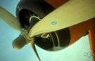 airplane propeller - a propeller that rotates to push against air