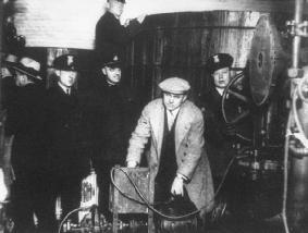 Police seize bootleg liquor during a Prohibition era raid in Detroit, Michigan. NATIONAL ARCHIVES AND RECORDS ADMINISTRATION
