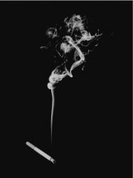 Transition from order to chaos (turbulence) in a rising column of cigarette smoke
